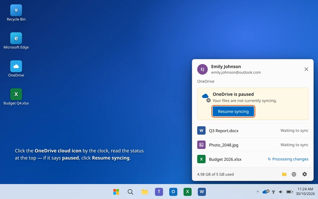 OneDrive cloud icon panel in Windows 11 showing sync paused status and Resume syncing option