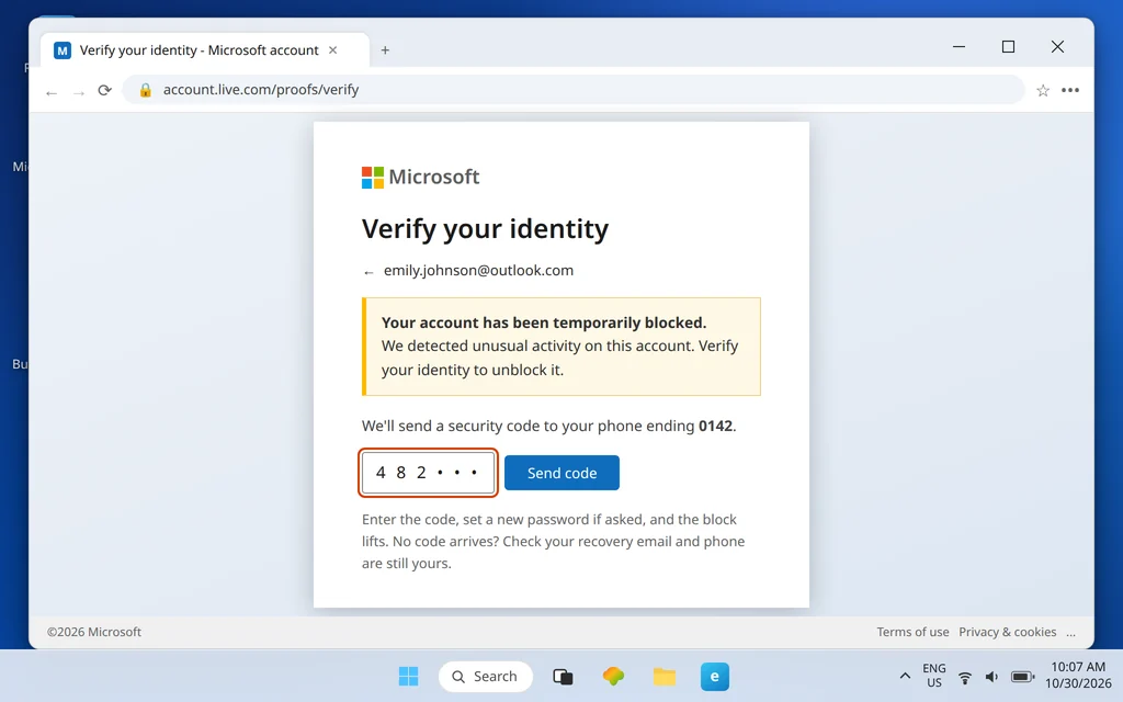 Microsoft account blocked message — unusual activity detected, verify your identity with a security code to unblock the Outlook.com account
