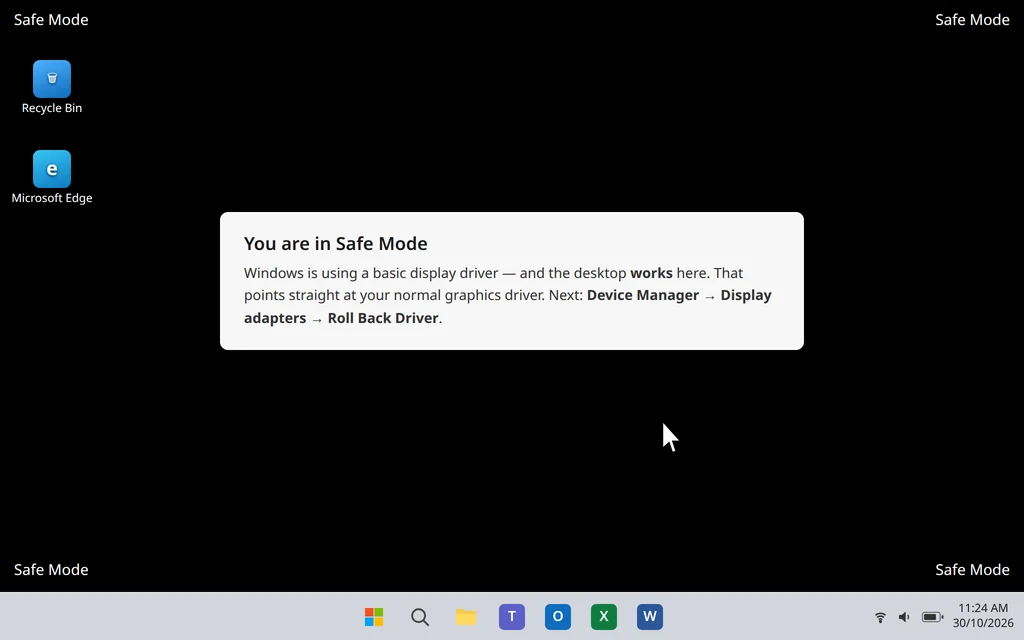 The Windows 11 desktop in Safe Mode with Safe Mode written in the corners of the screen