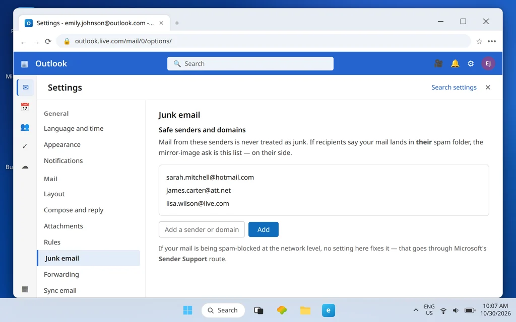 Outlook.com Settings Mail Junk email page showing the Safe senders and domains list