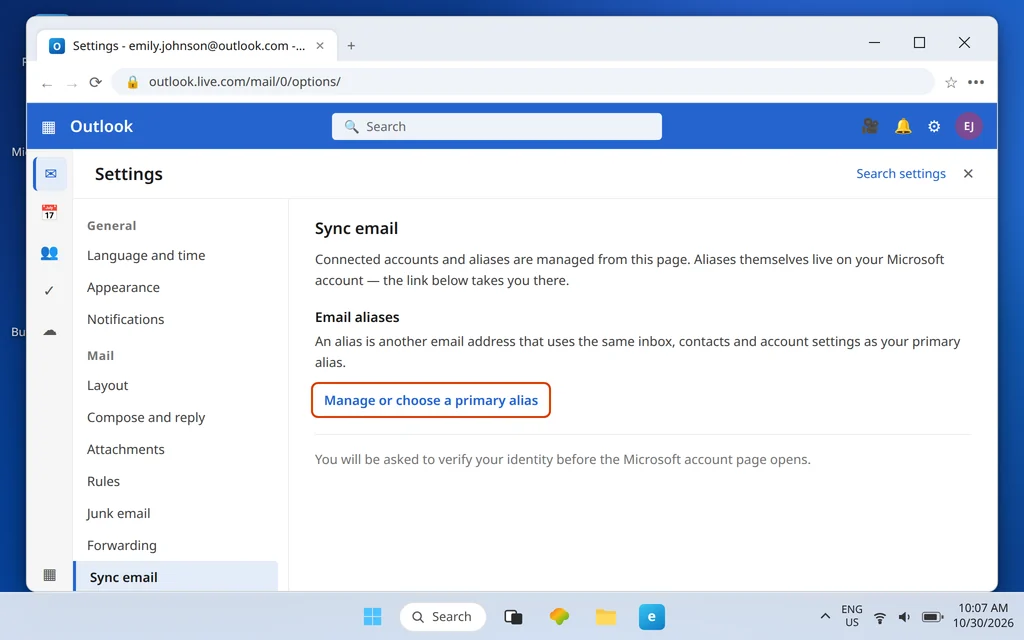 Outlook.com Settings Mail Sync email page showing the Email aliases section and the Manage or choose a primary alias link